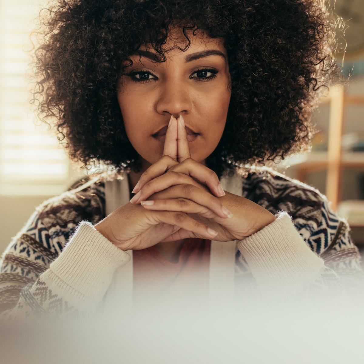 black woman deep in thought